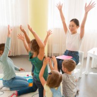 students-playing-game-with-their-kindergarten-teacher.jpg